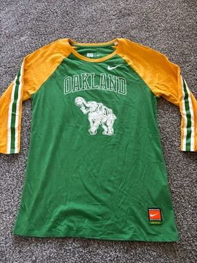Nike Cooperstown collection Green & Yellow Oakland A’s Raglan Baseball Tee